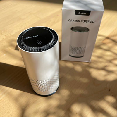 Product photography of a By Møller air purifier in a modern home setting.